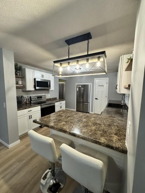5-Great extra seating and lighting in the kitchen.jpg