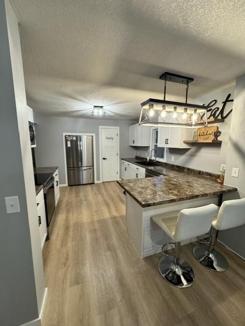 4-Kitchen view showing new appliances cabinets and countertops plus pantry.jpg