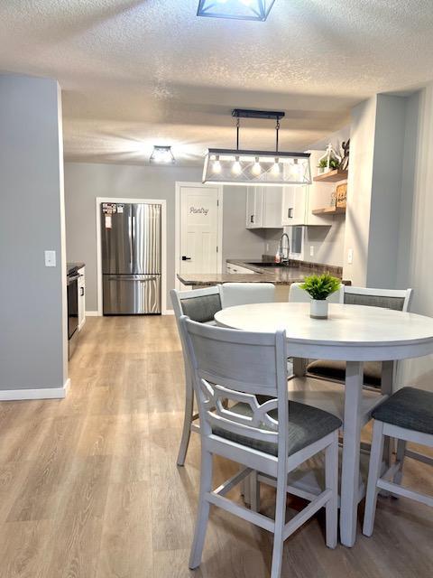 11-Dining room view showing open floor plan to kitchen.jpg