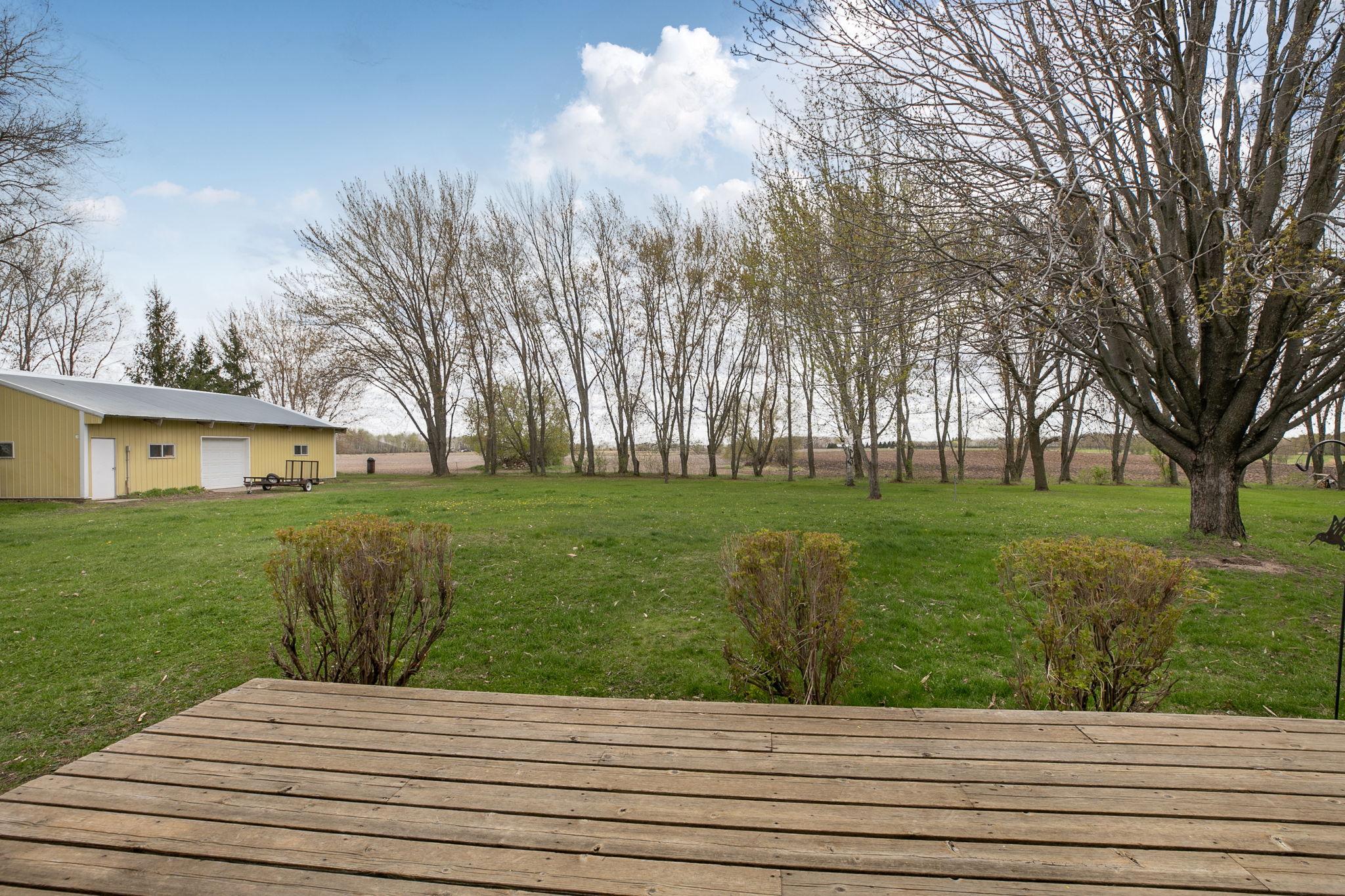 Enjoy The Back Deck Overlooking The Back Yard And Outbuilding!!
