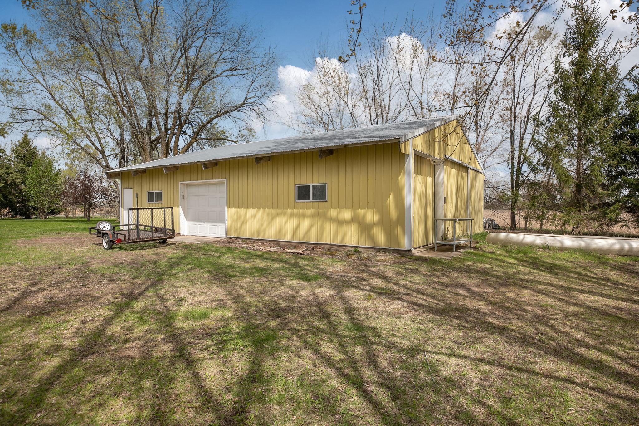 48x30 Pole Building With 9' Sidewalls, 9x7 Garage Doors And Two 9x9 Sliders! 30'x15' Portion Complete With Work Shop!