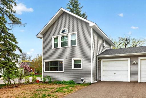 One stall garage with driveway.