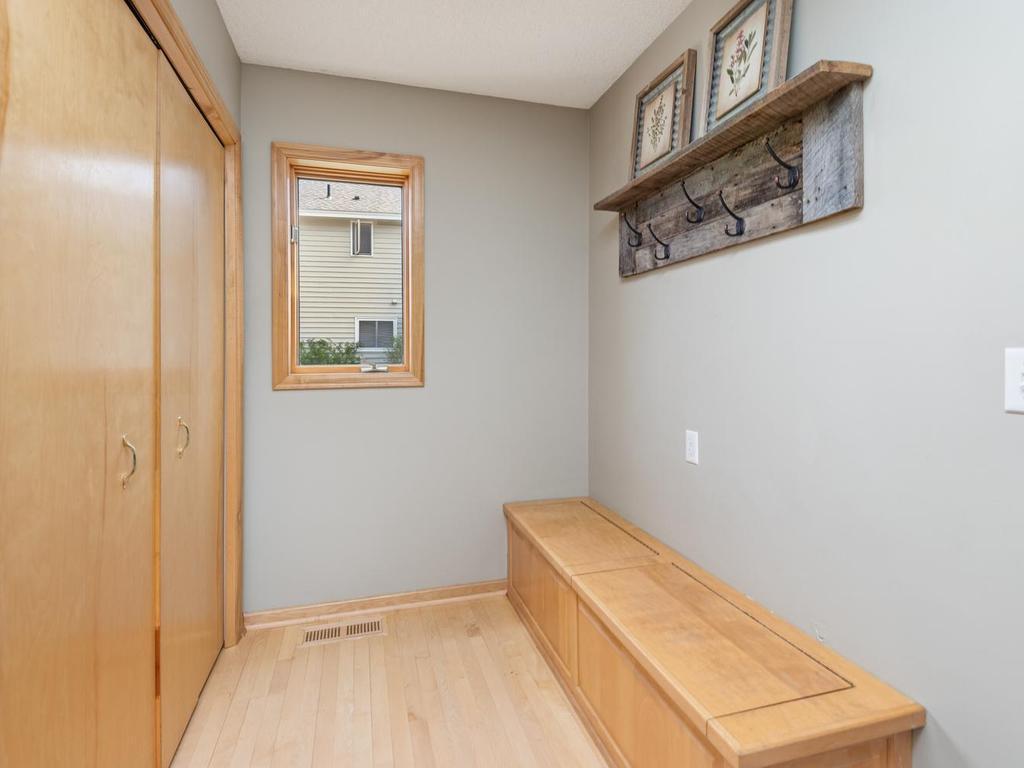 Mudroom measures 9’7” x 7’8” perfectly placed between the kitchen and the entrance from the garage. Huge closet for bulky winter-wear. Need more storage? The maple bench combines charm and practicality with extra storage space.
