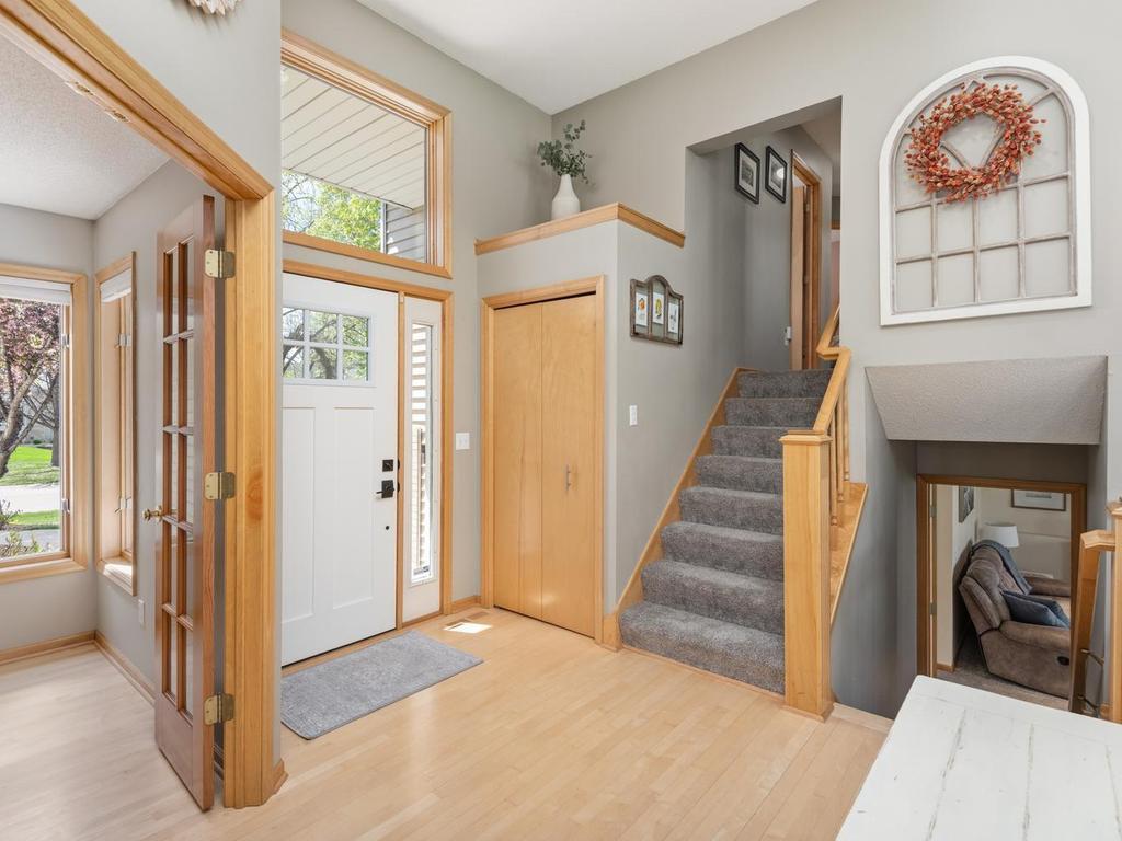 From the living room, venture up the stairs leading to the 3 upper-level bedrooms & 2 full bathrooms or descend to the lower-level walkout family room, a 4th bedroom and ¾ bathroom.