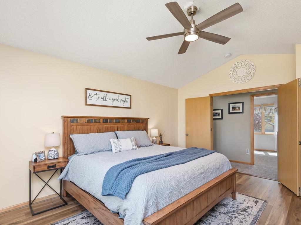The primary bedroom features new vinyl plank flooring.