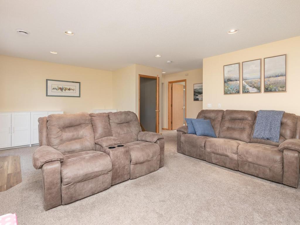 Beyond the family room is a 4th bedroom, ¾ bathroom and access to the lowest level (yep, more space!).