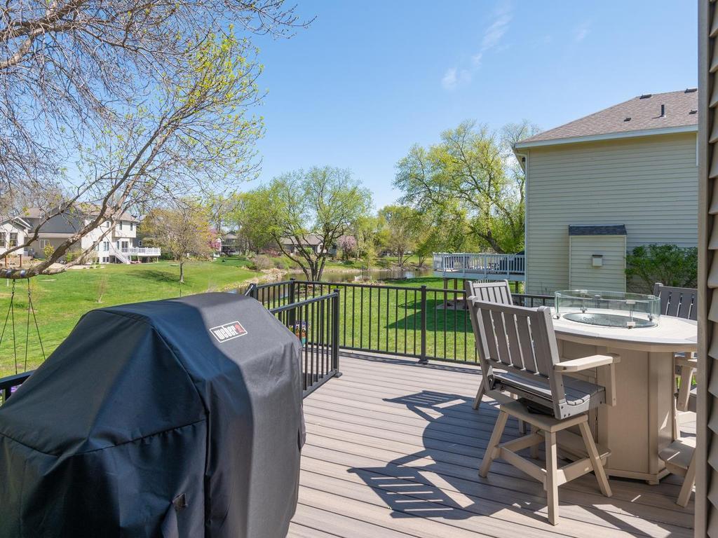 Fall in love with the new and generously sized maintenance-free Trex deck with stairs leading to the backyard.