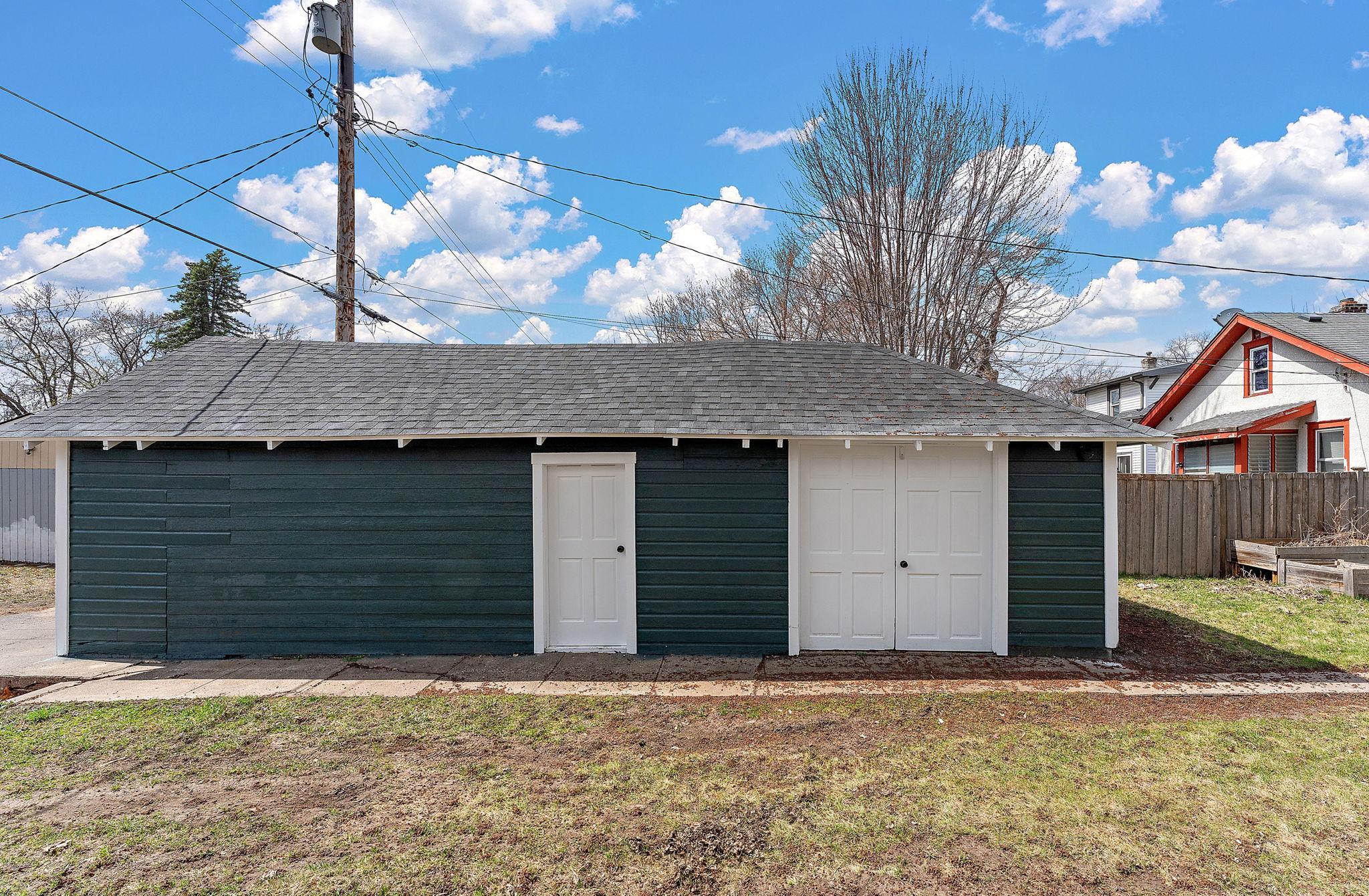 Side view of garage and workshop doors