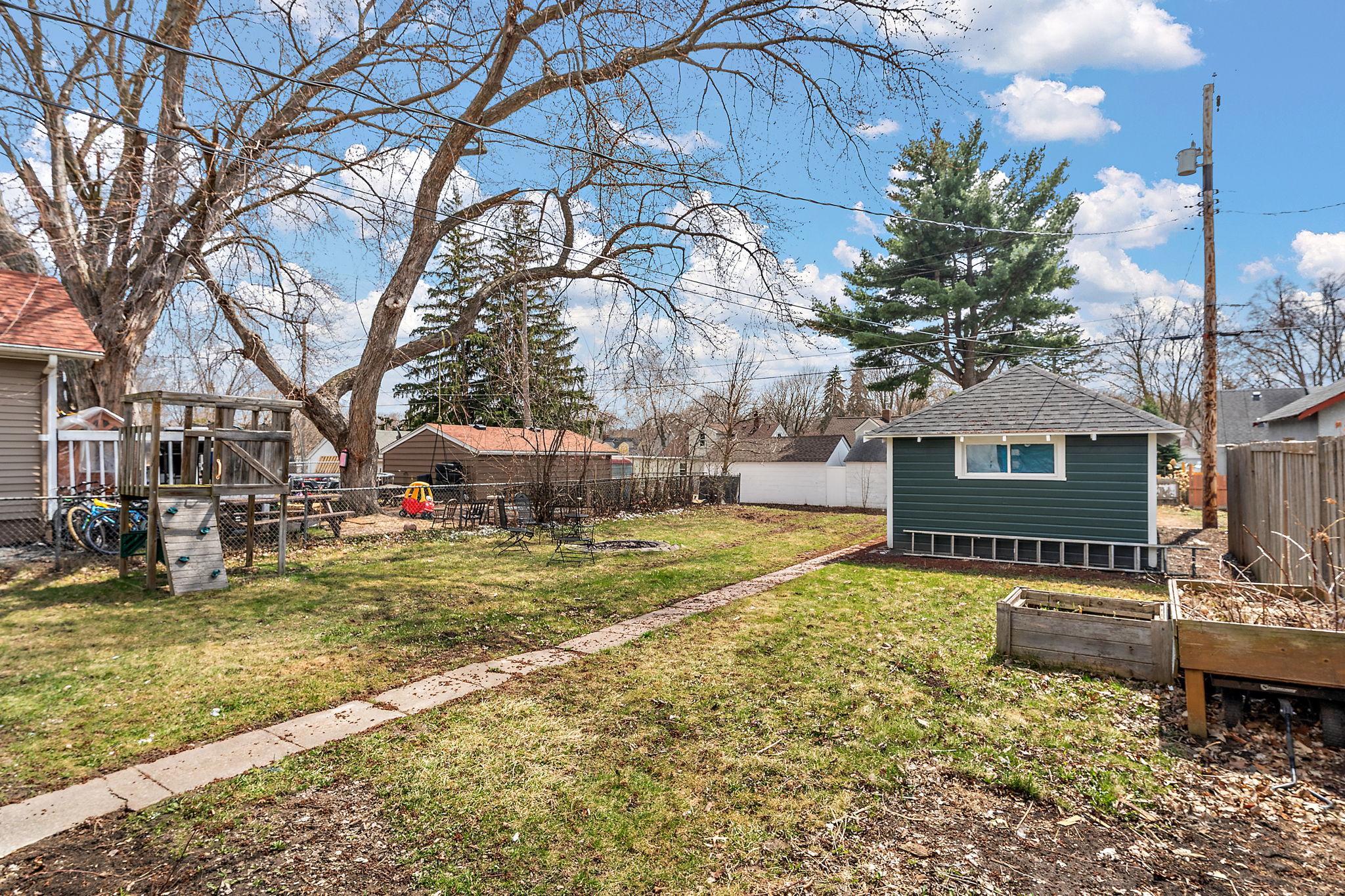 A spacious backyard that is ready for summer fun
