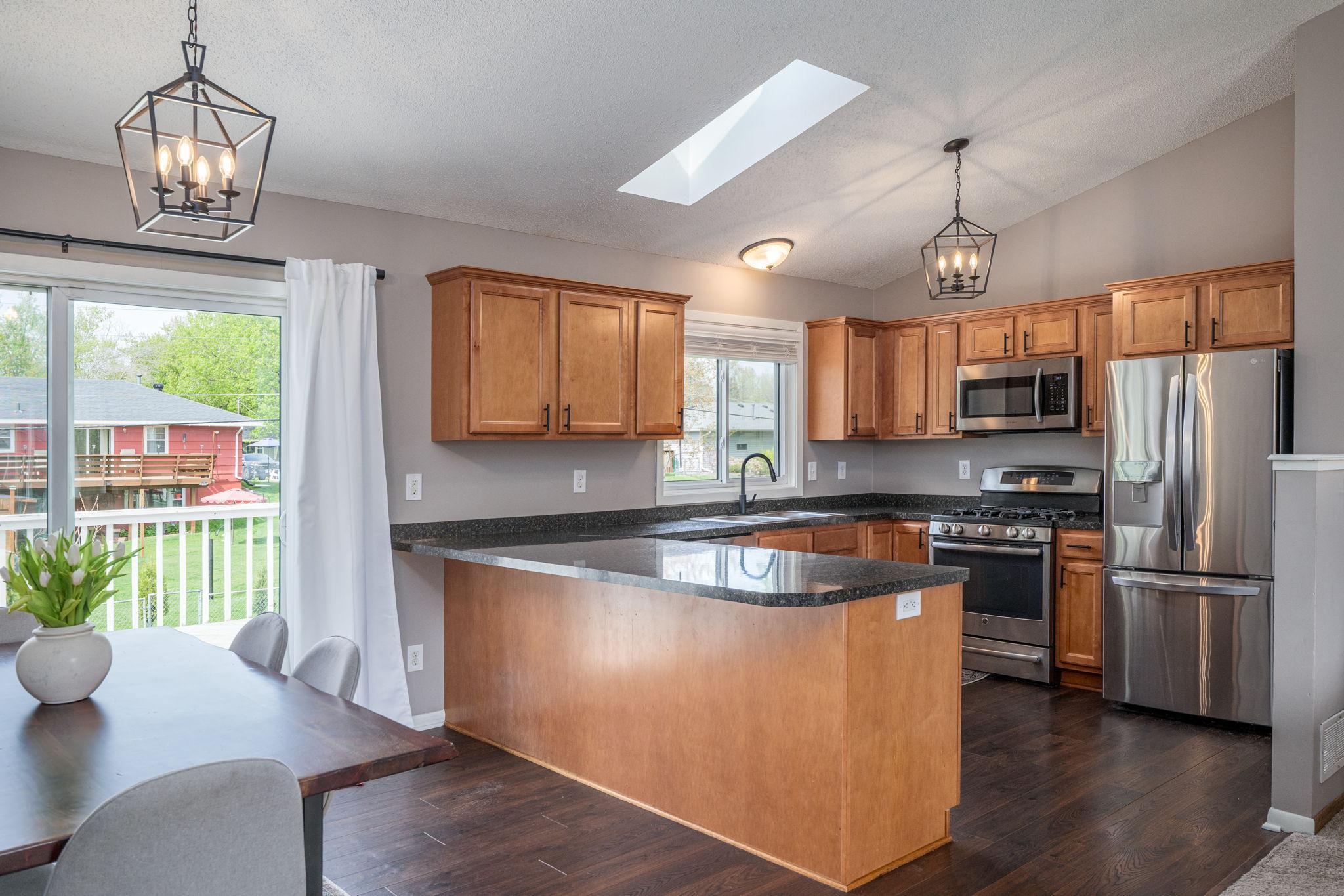 Updated Kitchen! Plenty of Counter Space, and with the Dining Area and Living Area, It makes for a Great Gathering Space Too!