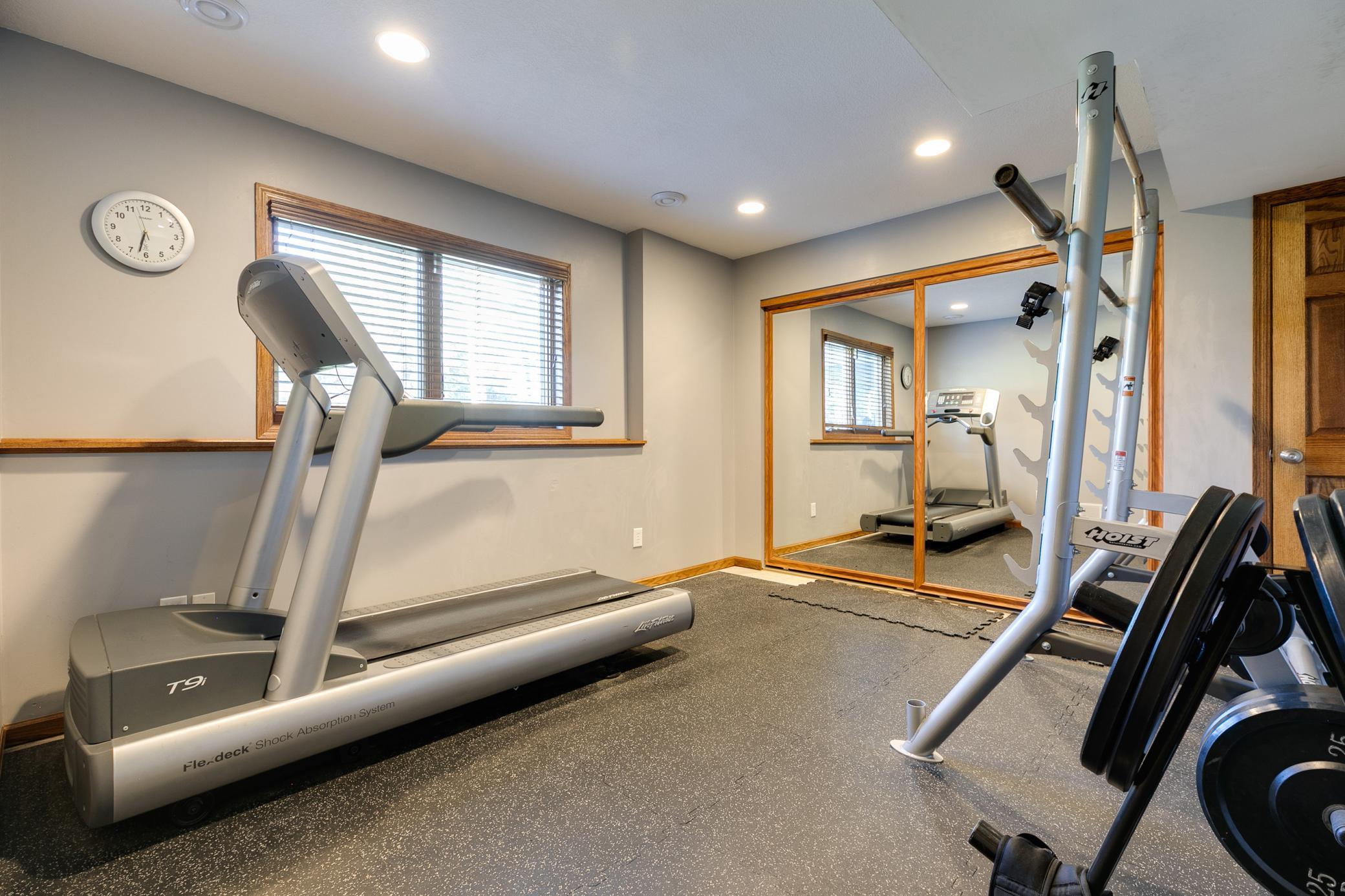 The sellers currently use the 5th bedroom on the lower level as an exercise room. The exercising mats
will not be included with the property.