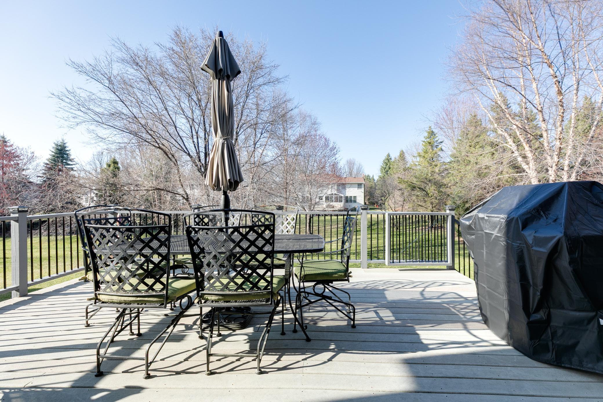 This maintenance-free vinyl deck and as an added bonus, all wood railings and spindles were replaced in 2020.