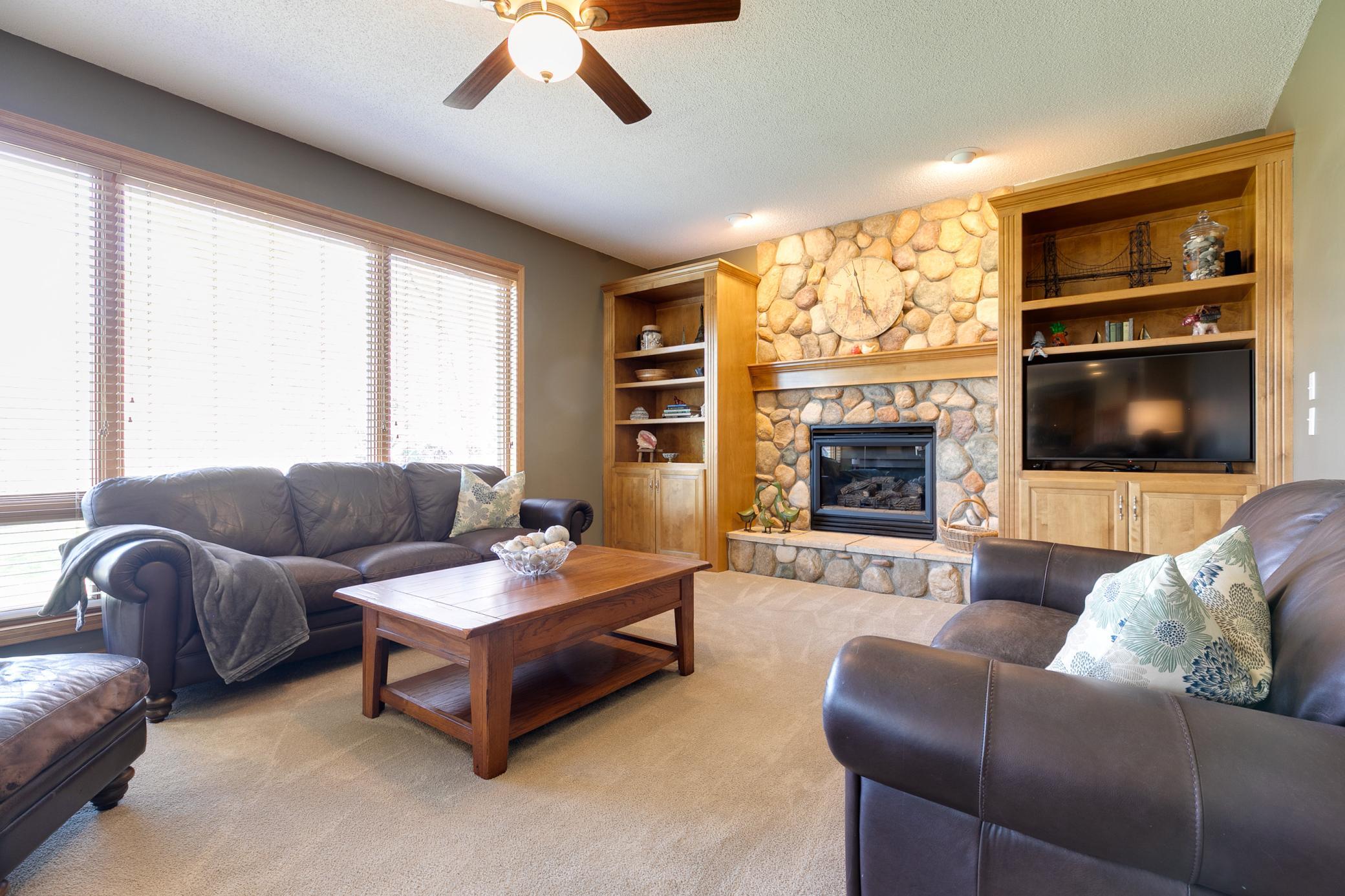 The TV with remote and wired-in speakers in the family room will stay with the home.