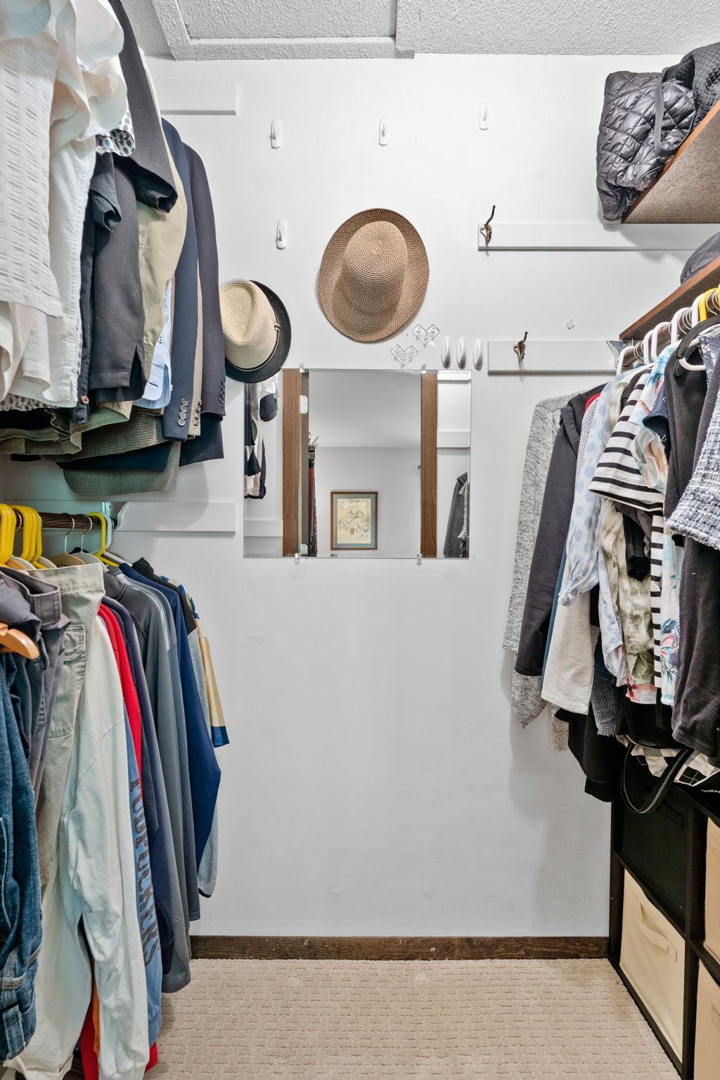 Primary walk in closet.