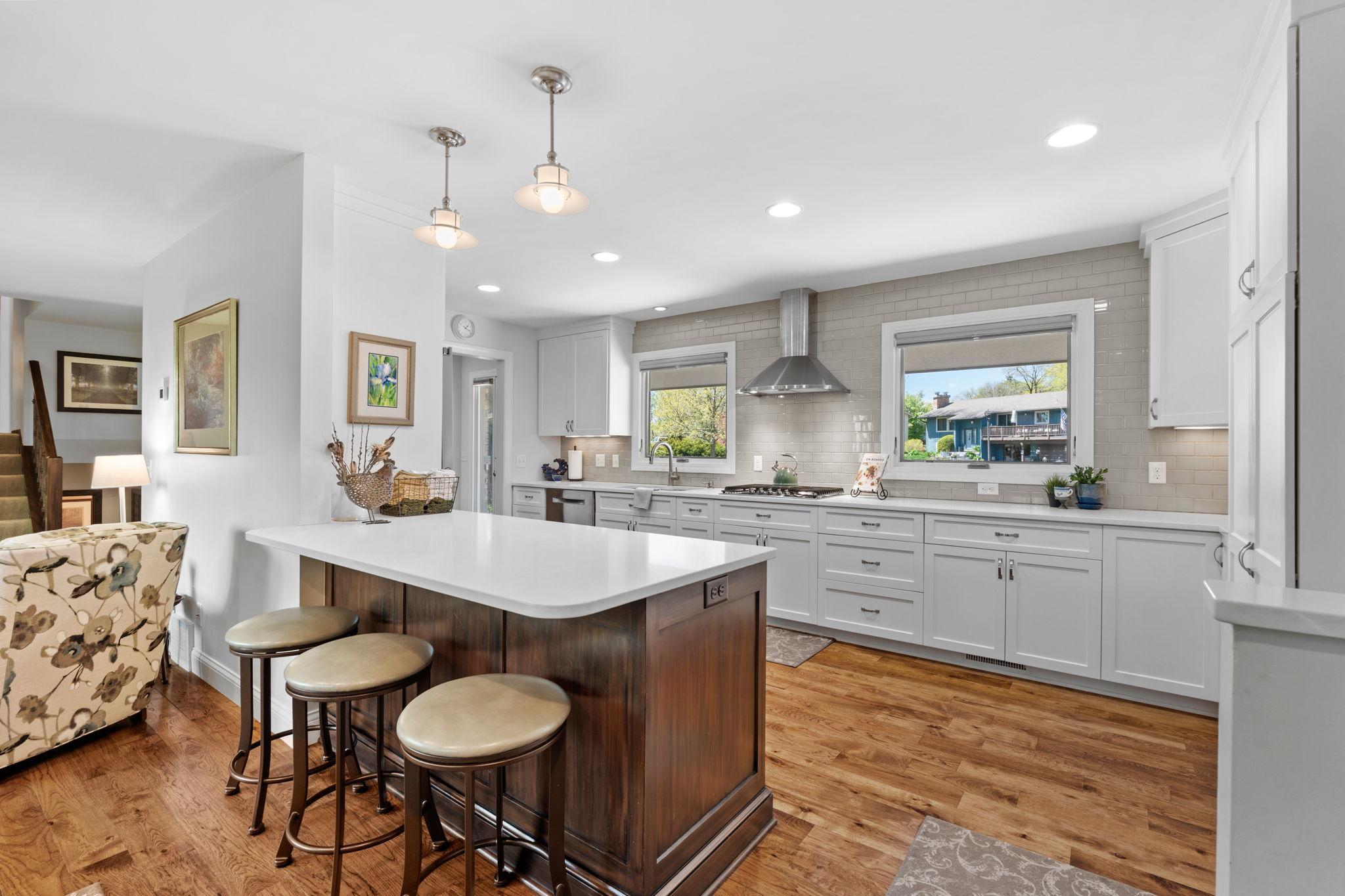 Start making your way into this chef's dream kitchen space. Quartz counter tops, tile backsplash, soft close cabinets & drawers and stainless steel appliances!