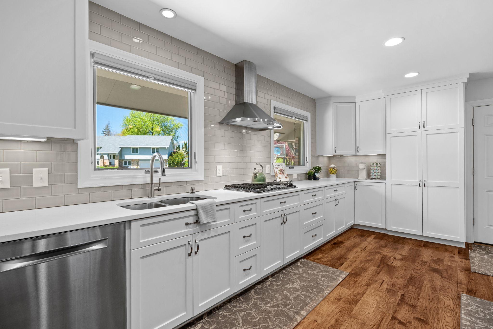 Additional view of the kitchen + pantry storage.