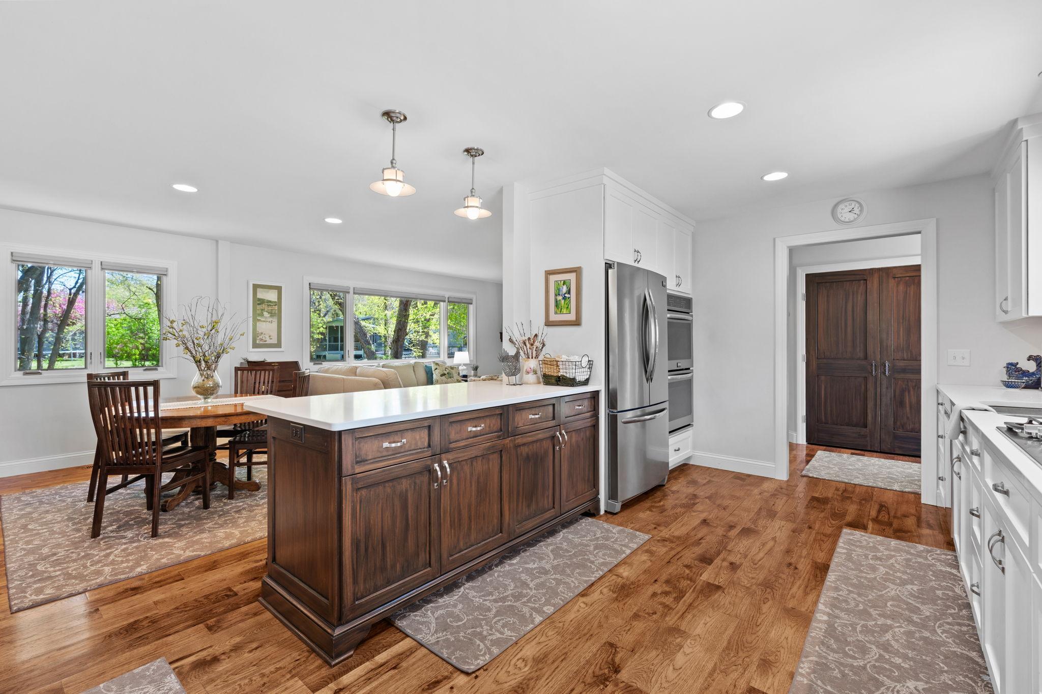 View of the peninsula - additional storage and large countertop. Double wall oven on the right - a entertainers dream for large dinners!