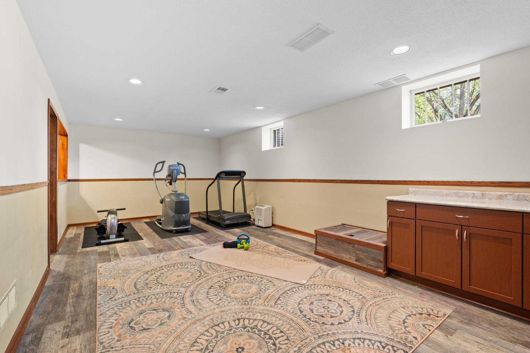 The finished basement! Use as an exercise room, kids play room, craft area, home office space - the choice is yours!