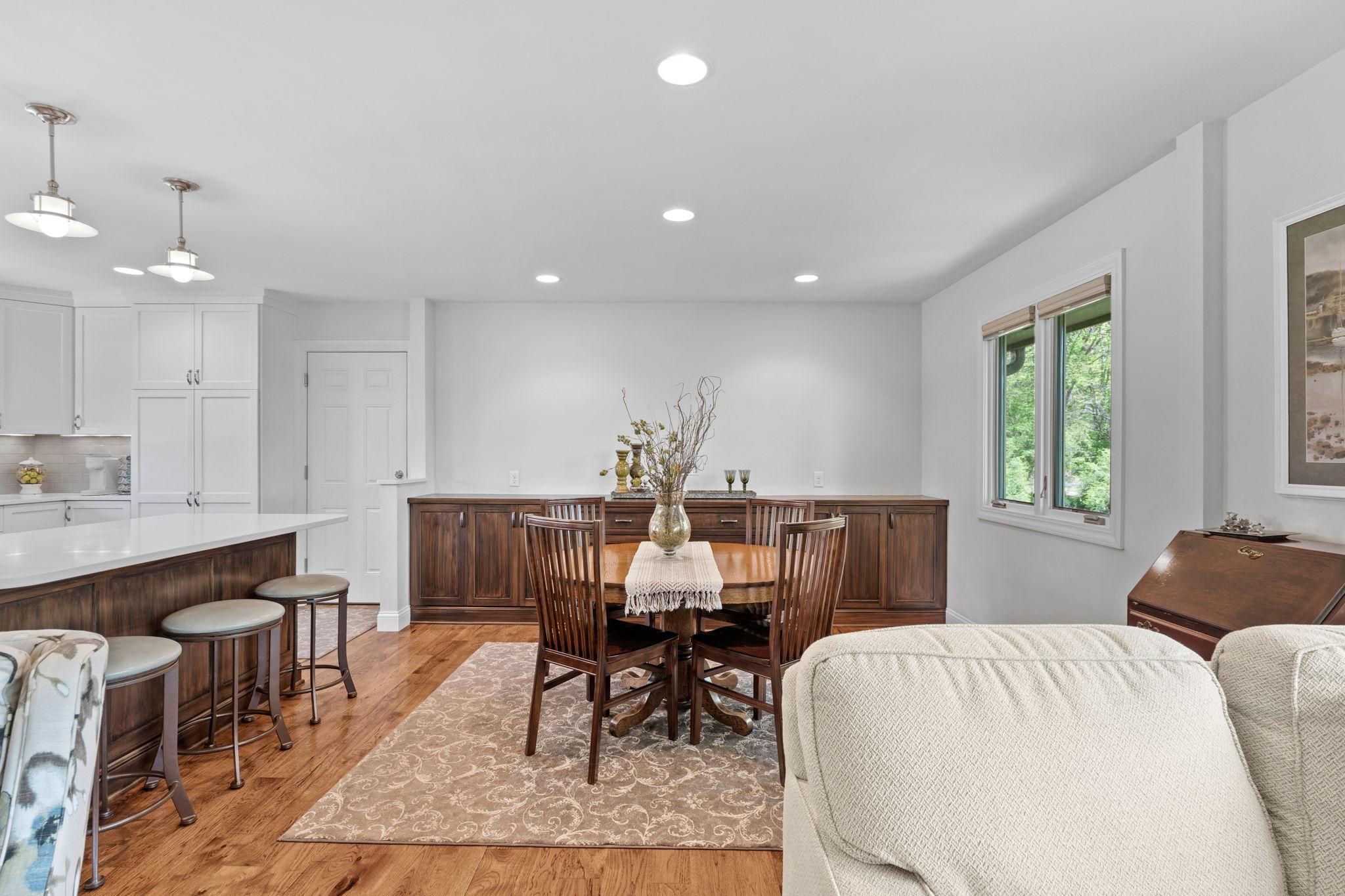 View of the dining + breakfast bar space.