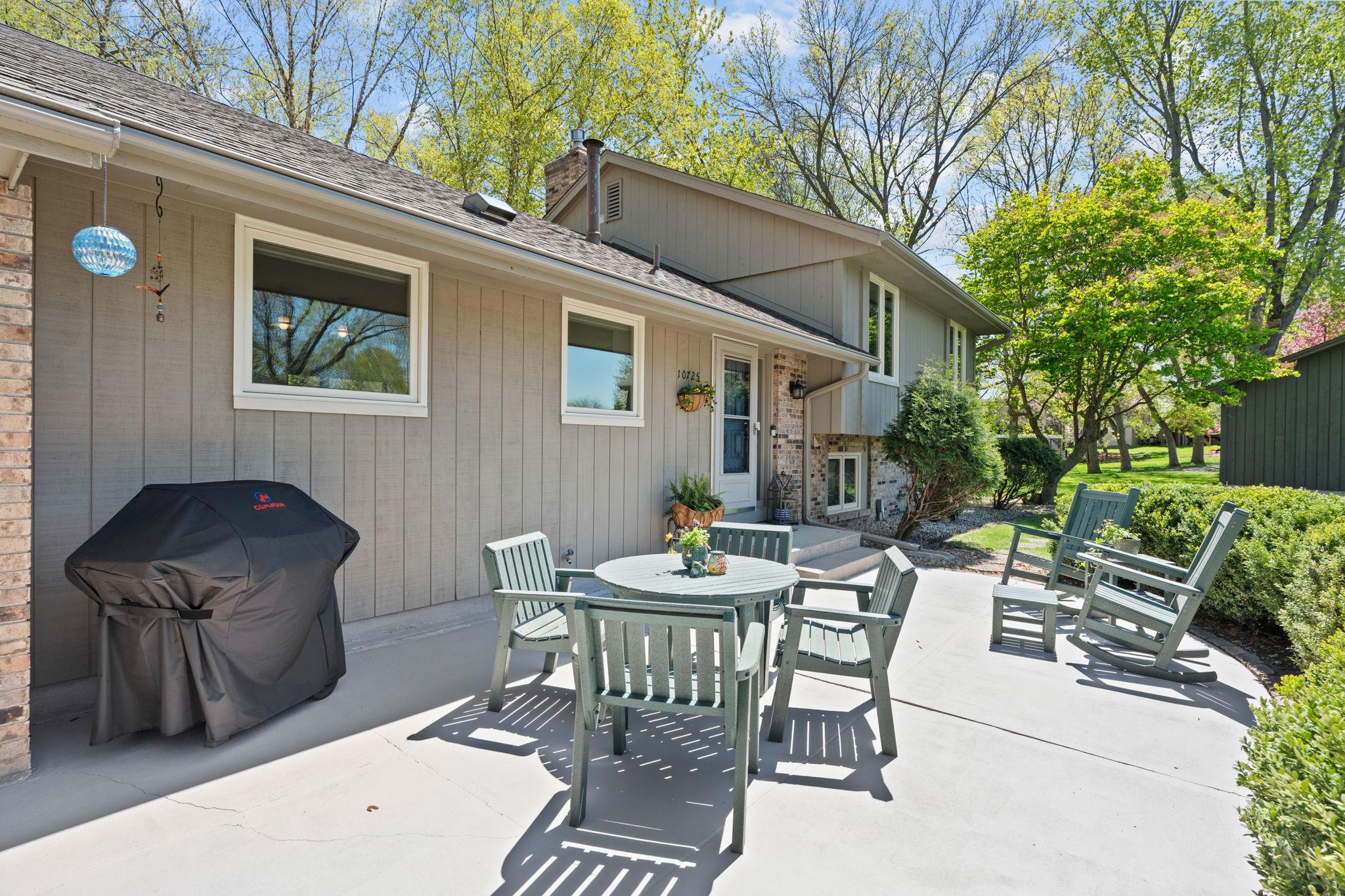 The front patio is the perfect spot to enjoy a morning cup of coffee, watch the kiddos play in the cul-de-sac, or grill out for guests.