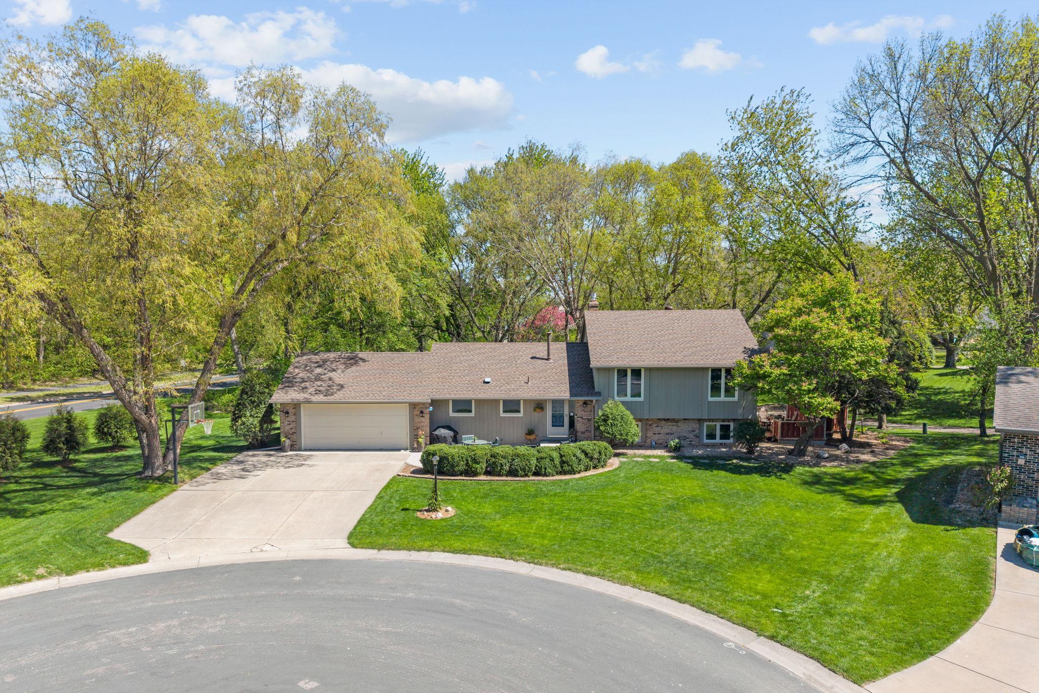 Come Home to 10725 Woodwatch Cir, Eden Prairie!