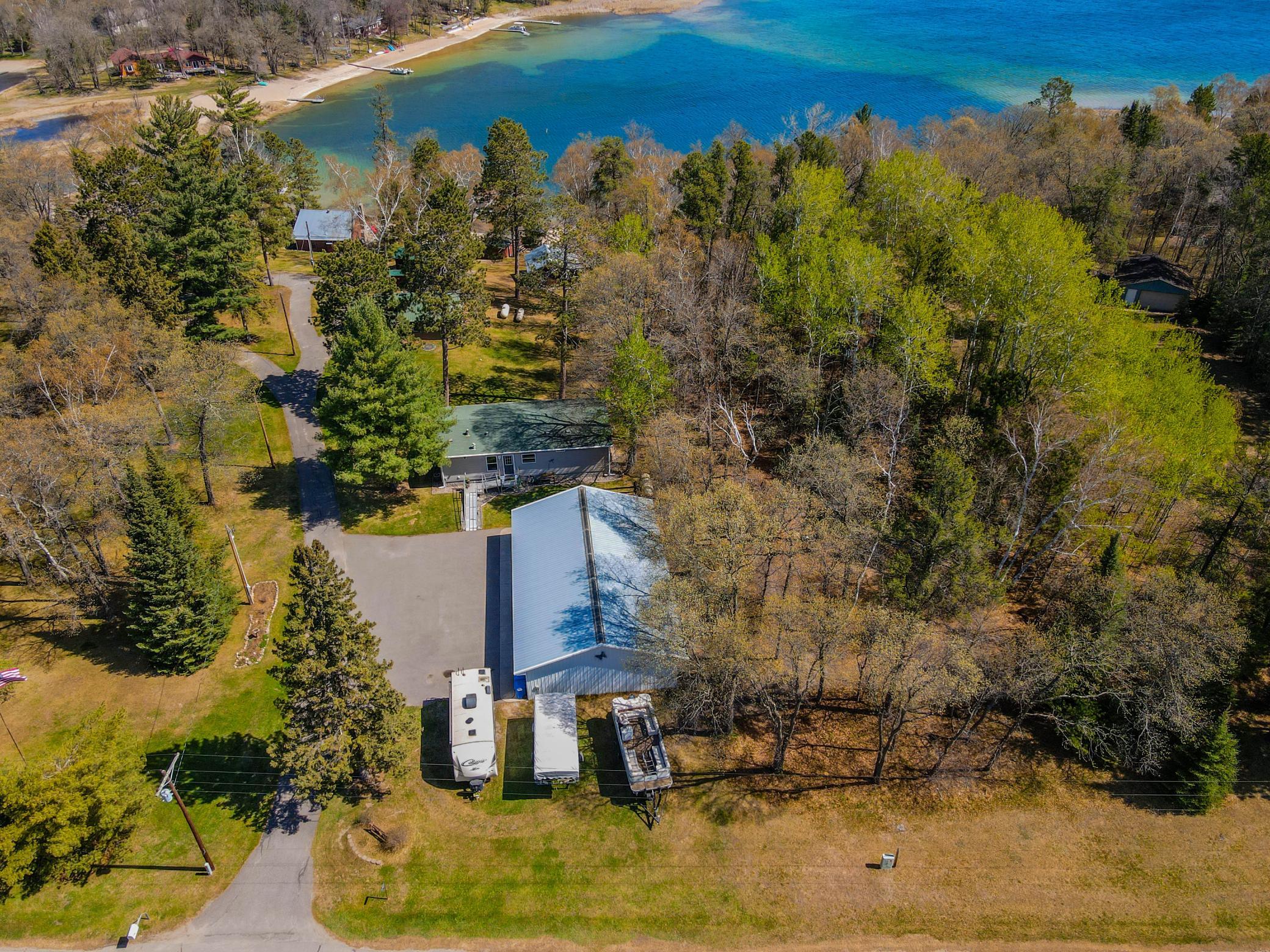 Above the 2.52 Acres and Crystal Clear Waters of Lake Belle Taine
