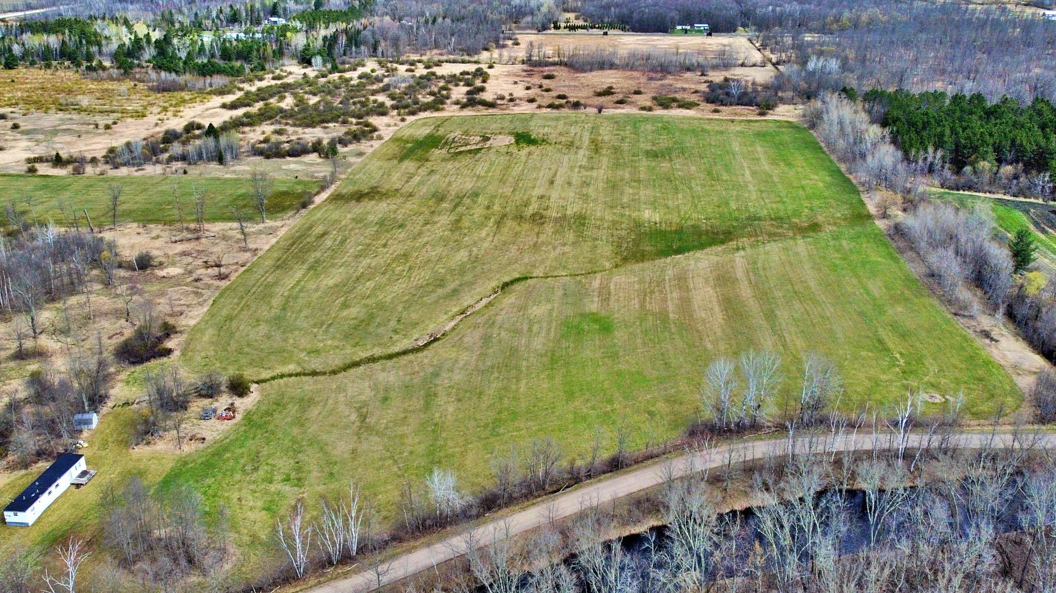 Aerial view of property in relation to 405th St.jpg