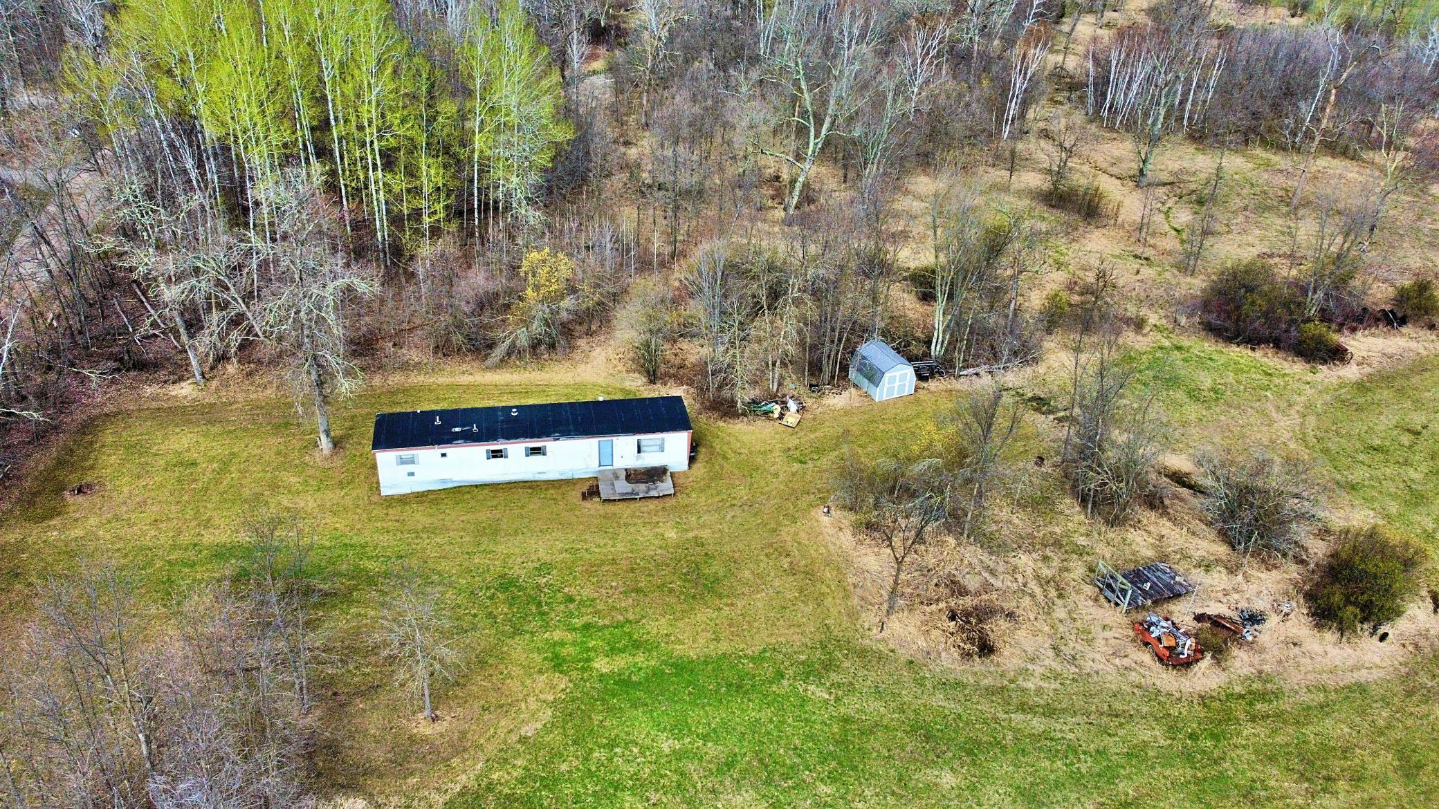 Aerial view of gated property with trailer electric and camper hook-ups .jpg