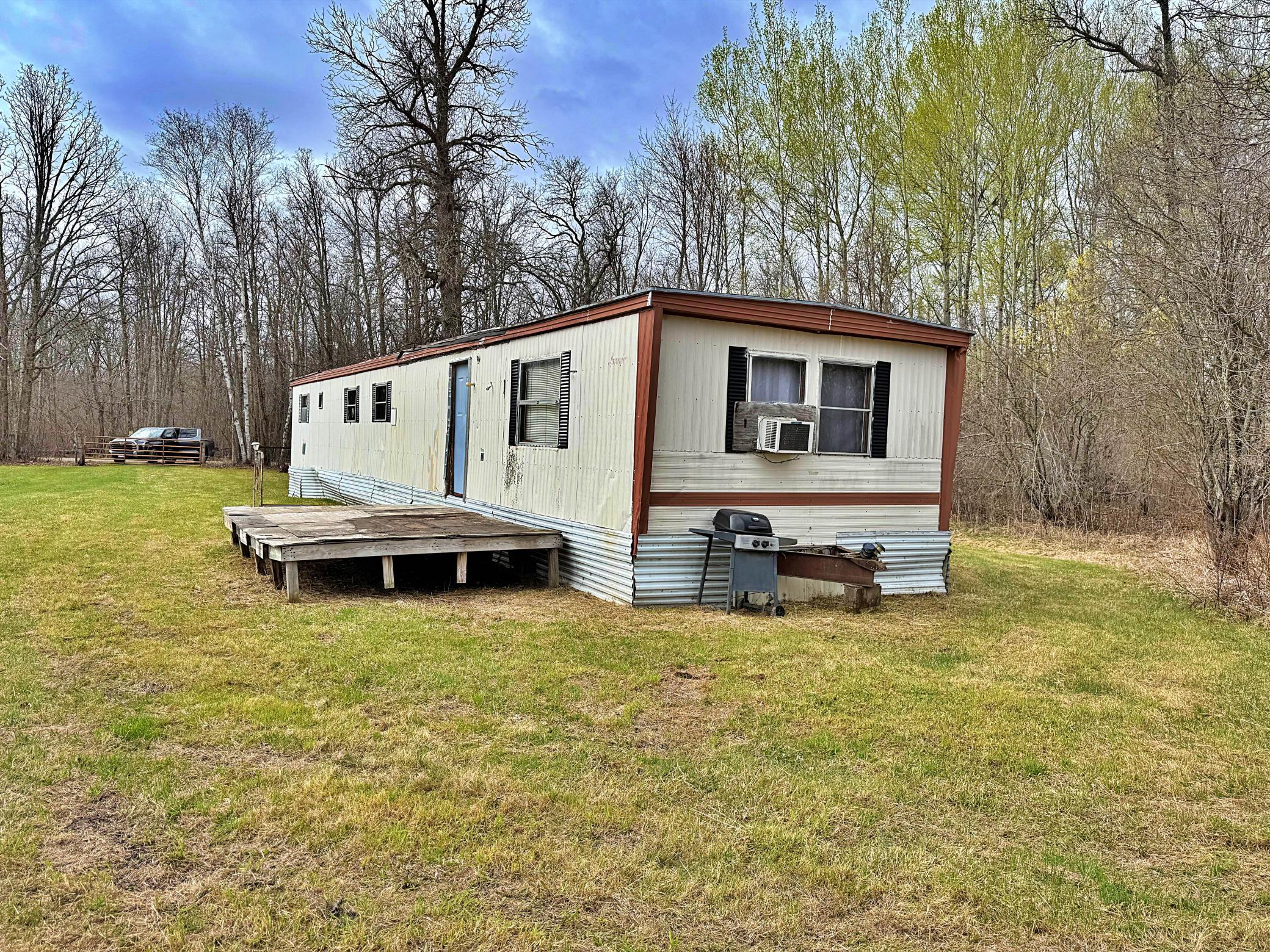 View of camper with gated entrance.jpg