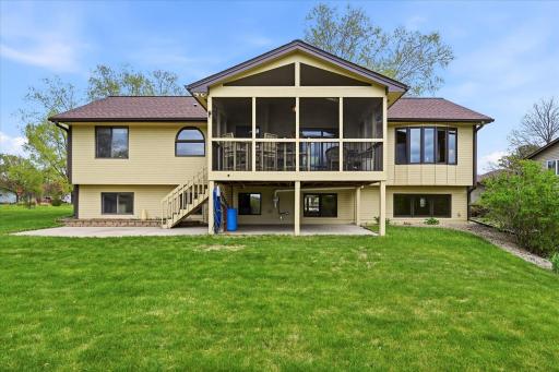 The roof and skylights in both the kitchen and porch were replaced six years ago. The patio slab continues under the rear porch for storage and the electrical hookups and outside water are in place for a patio hot tub.