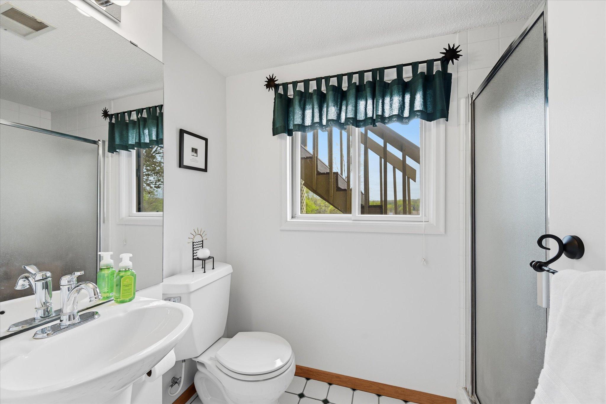 Lower bath is getting a brand new toilet this week. Ceramic floors, shower and linen cabinet.