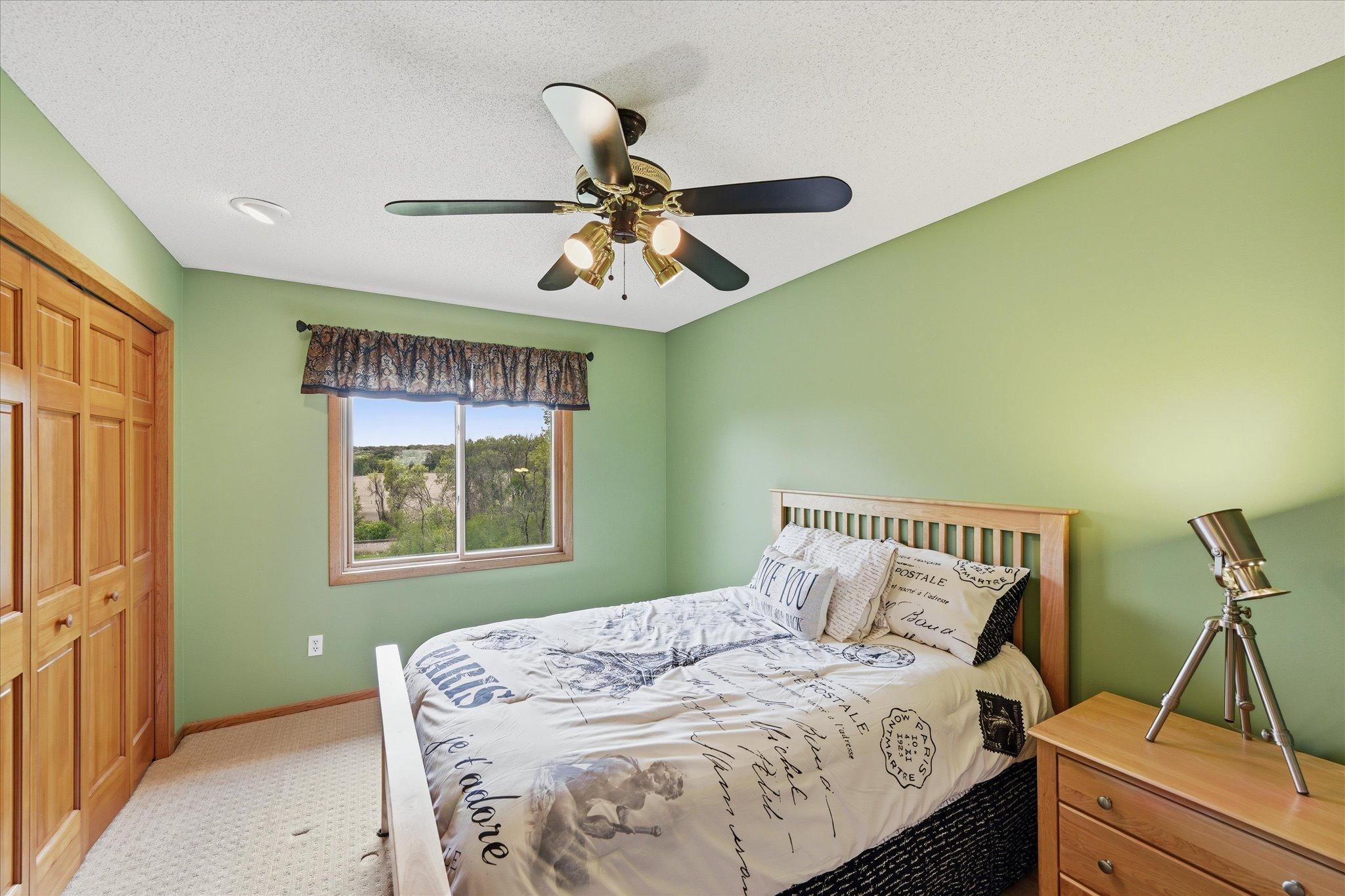 Bedroom 1 has beautiful views out the back of the home. Paneled doors throughout.