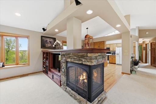 Upgraded 3 sided gas fireplace and entertainment media center.