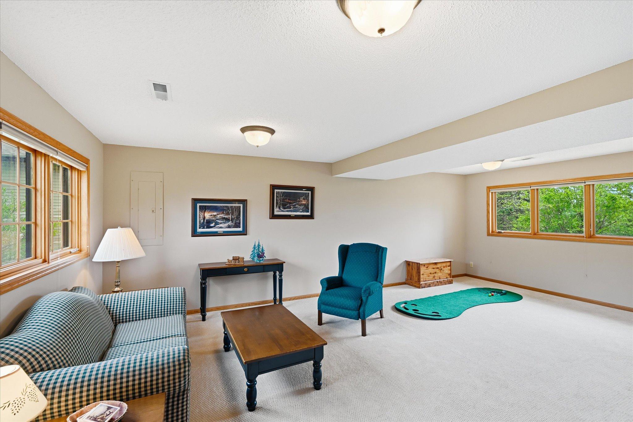 Whether you want to snuggle in for a movie or practice your putting, this area will not disappoint.