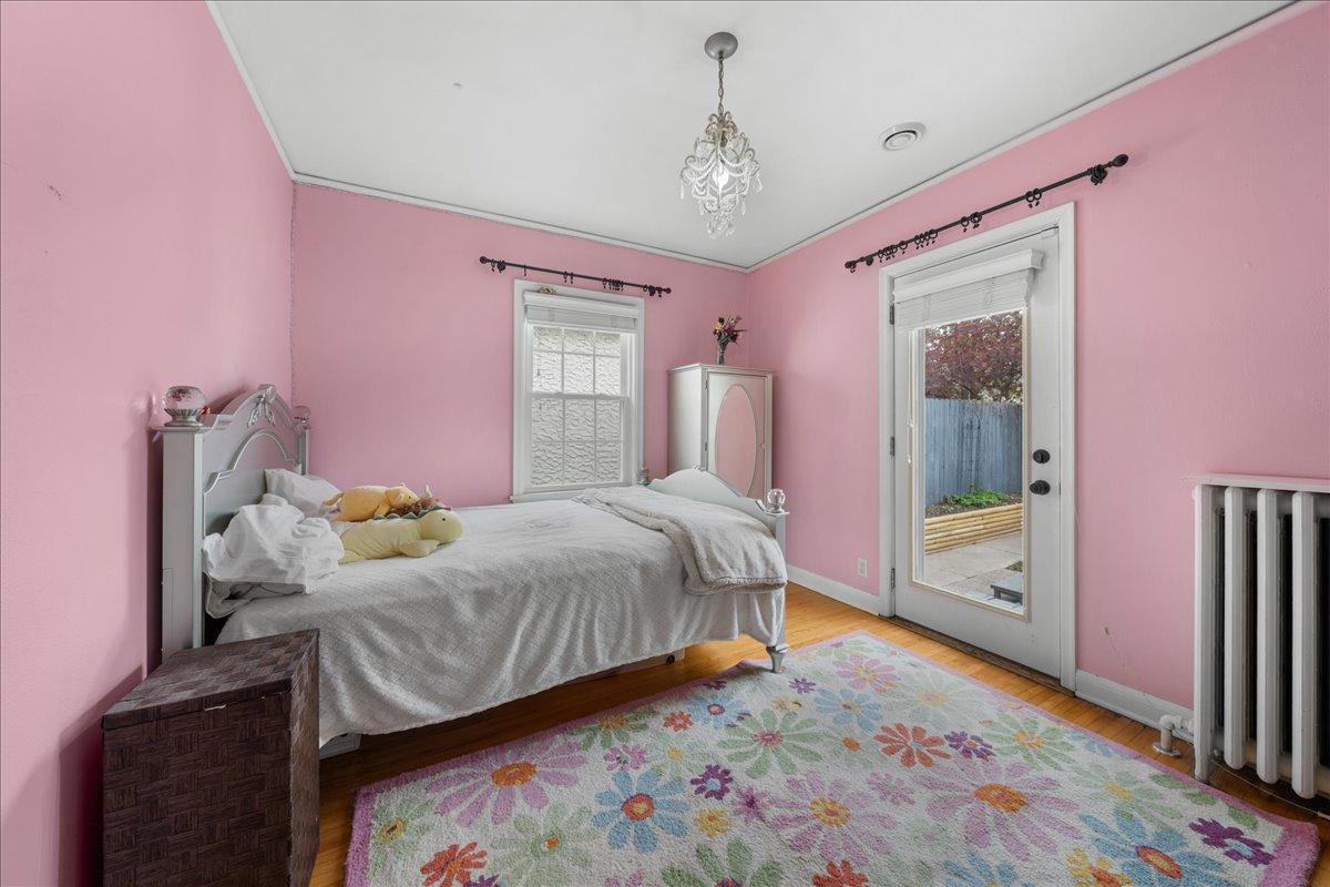 Main floor bedroom, could be used as a reading room/den