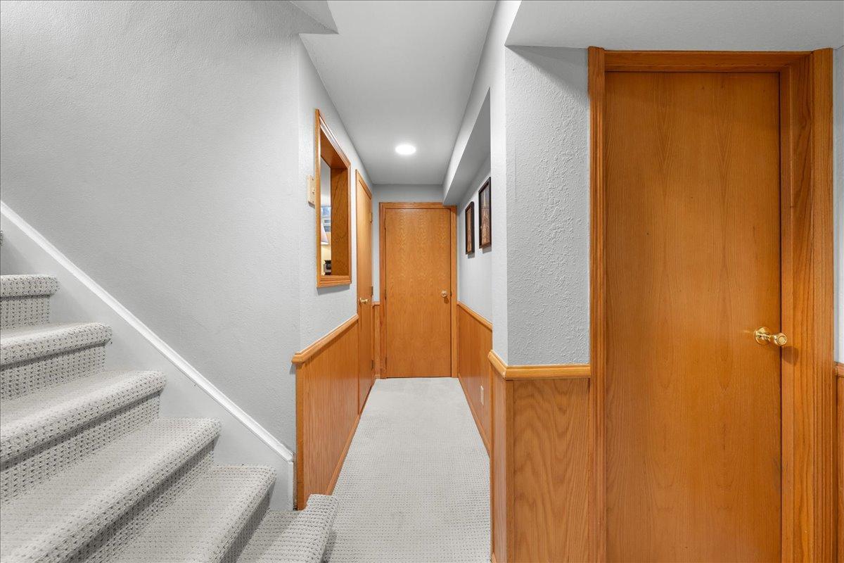 Hallway in the Lower Level leading to the flex space; currently used as an office