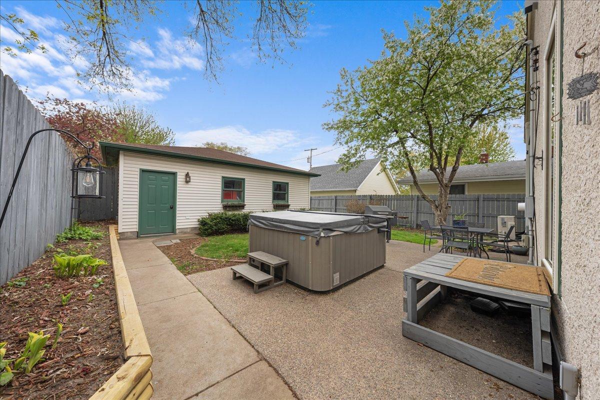 Hot tub will stay with the property for your enjoyment. The garden/retaining wall was rebuilt in 2026