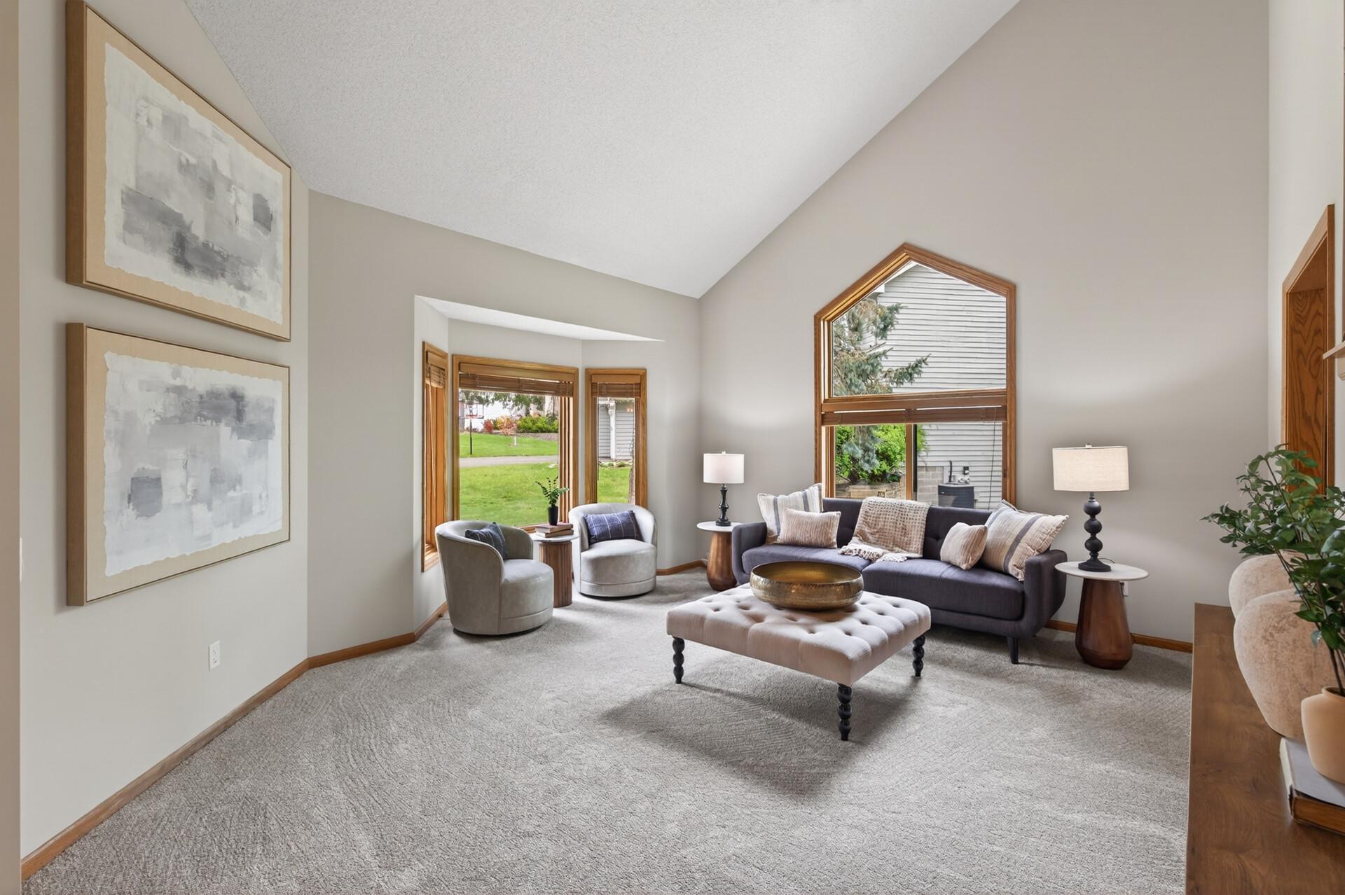 Main floor living room with 17' ceiling