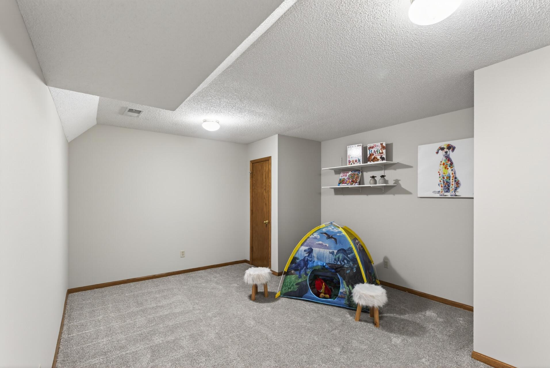 Bonus area in lower level that could be a play room, gym, or office