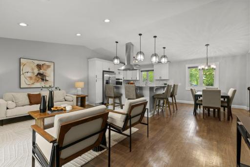 Open floor plan with vaulted ceiling