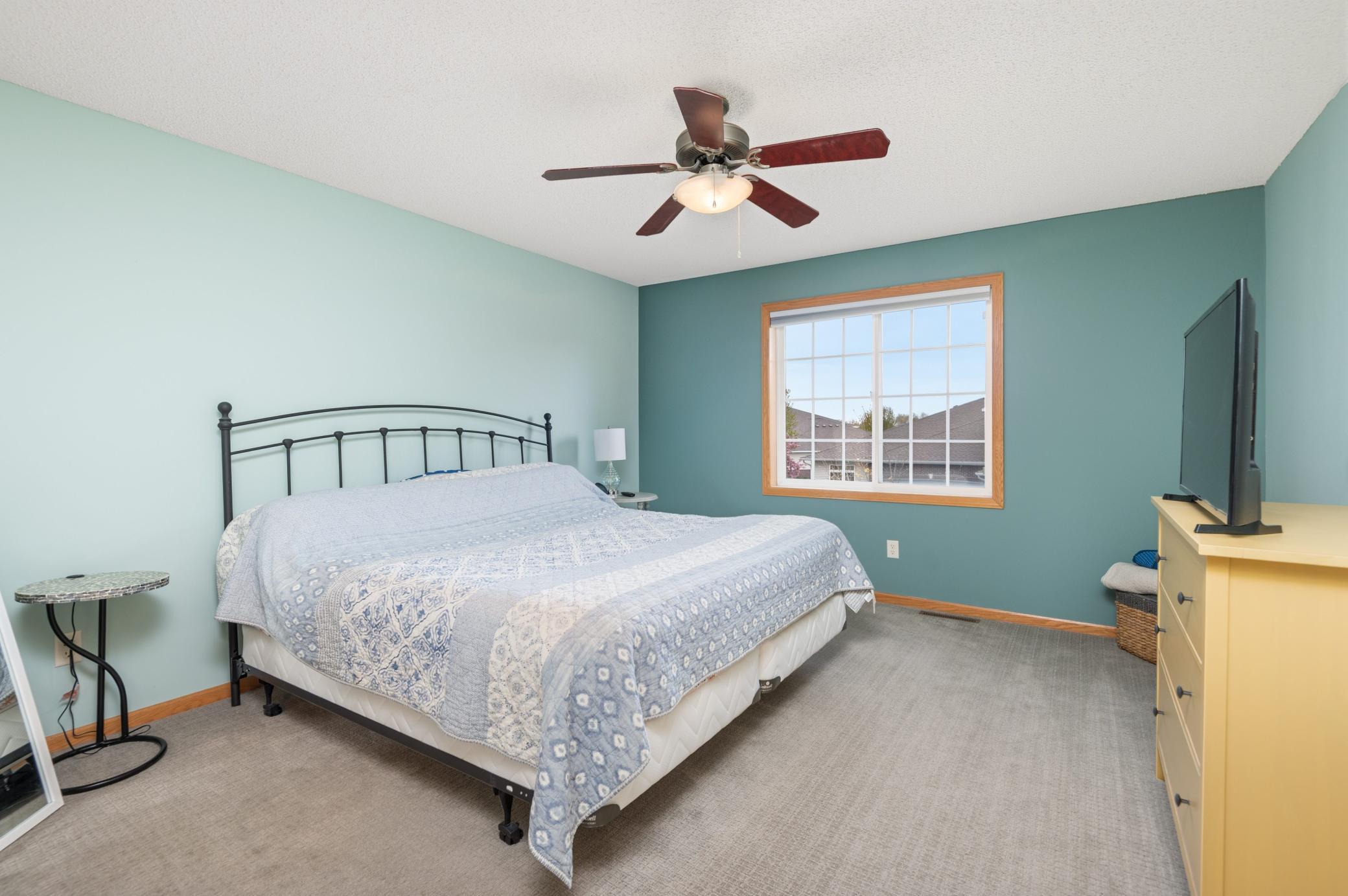 Primary bedroom with ceiling fan!