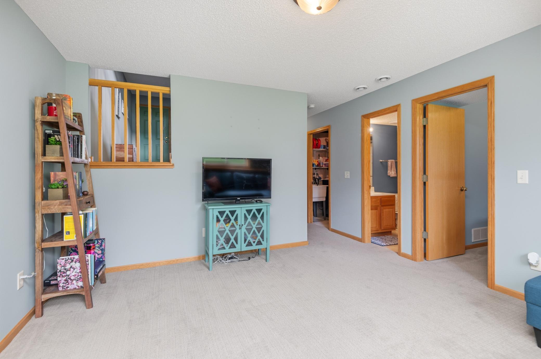 Family room with neutral carpet and color choices!