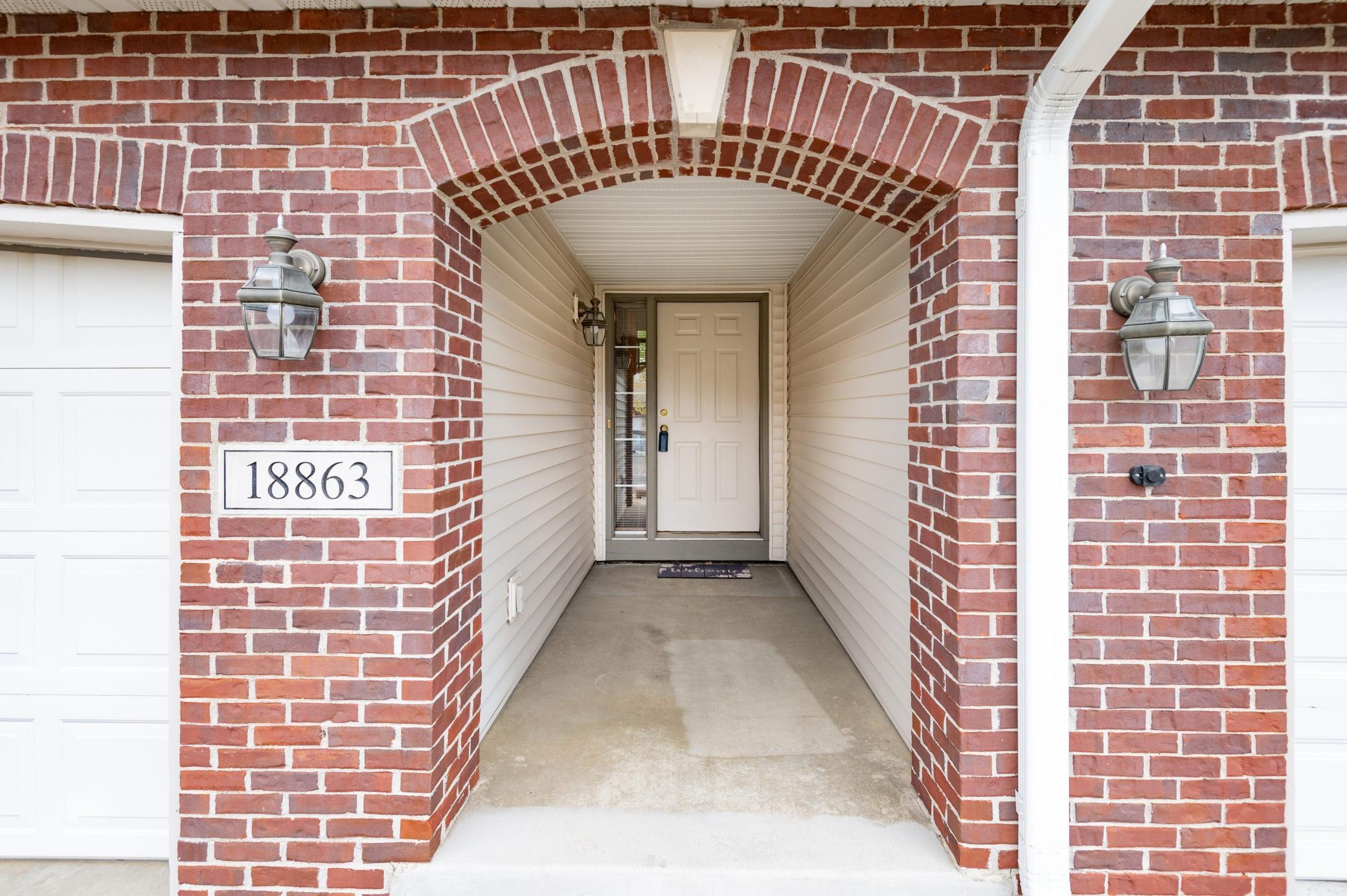 Private entrance with beautiful brick accents!