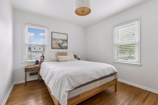 The main level offers two Bedrooms which have been updated with enameled millwork and designer lighting.