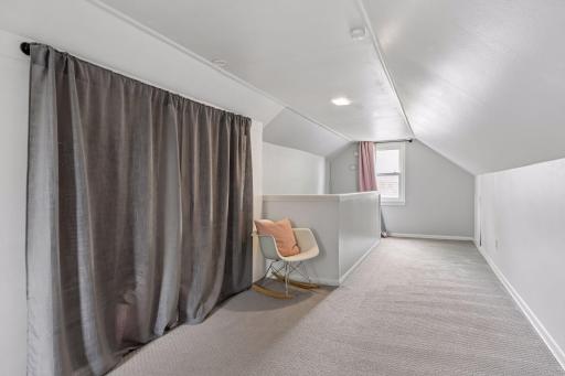 The upper level bedroom features a wall closet and plenty of space to spread out.