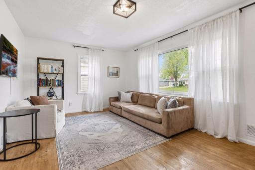 Freshly updated throughout, the home offers designer lighting and new fixtures throughout.