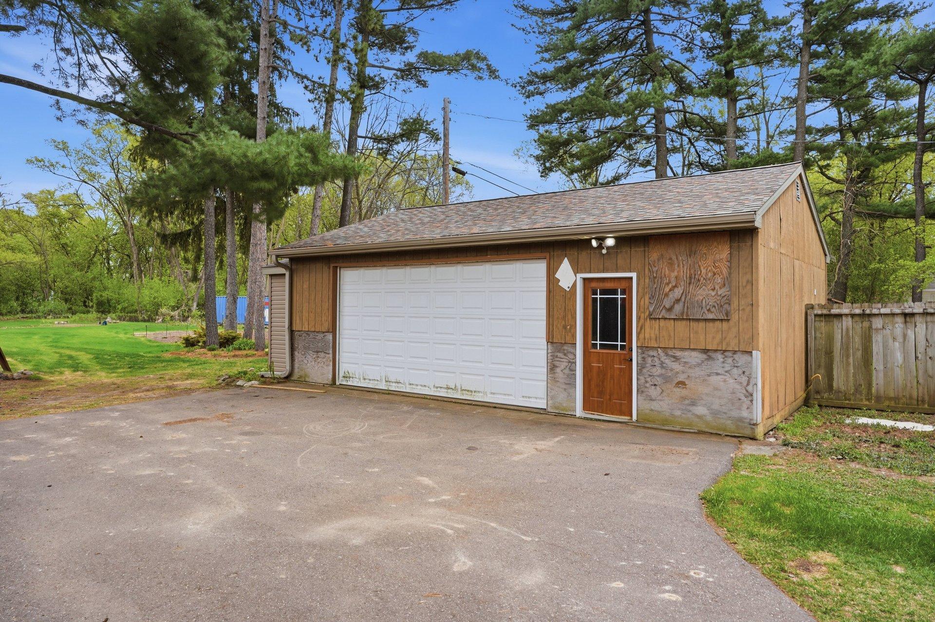 The oversized 2-car garage offers incredible space for vehicles, toys, tools, storage, or even a workshop setup — a rare and highly sought-after feature!