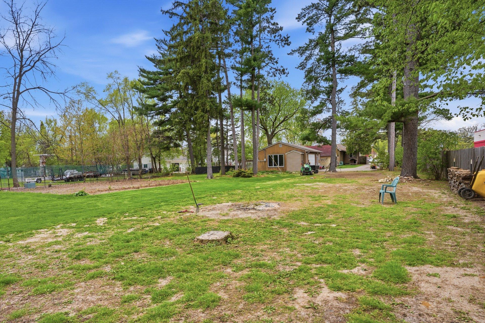 Hard to believe settings like this still exist in the heart of the city! Enjoy the rare combination of privacy, mature trees, and nearly an acre of peaceful outdoor space while still being just seconds from shopping, dining, parks, and everyday conve
