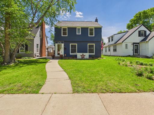 BEGIN TOUR - Two-story colonial tucked back from the street.