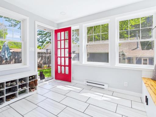 Step out onto the backyard patio then head over to the garage.